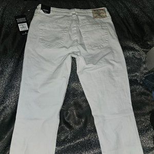 JENNIE MID RISE CURVY SKINNY JEAN